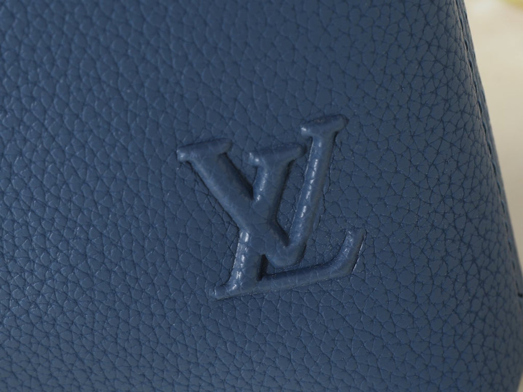 Louis Vuitton Takeoff Leather Wristlet Clutch — detail
