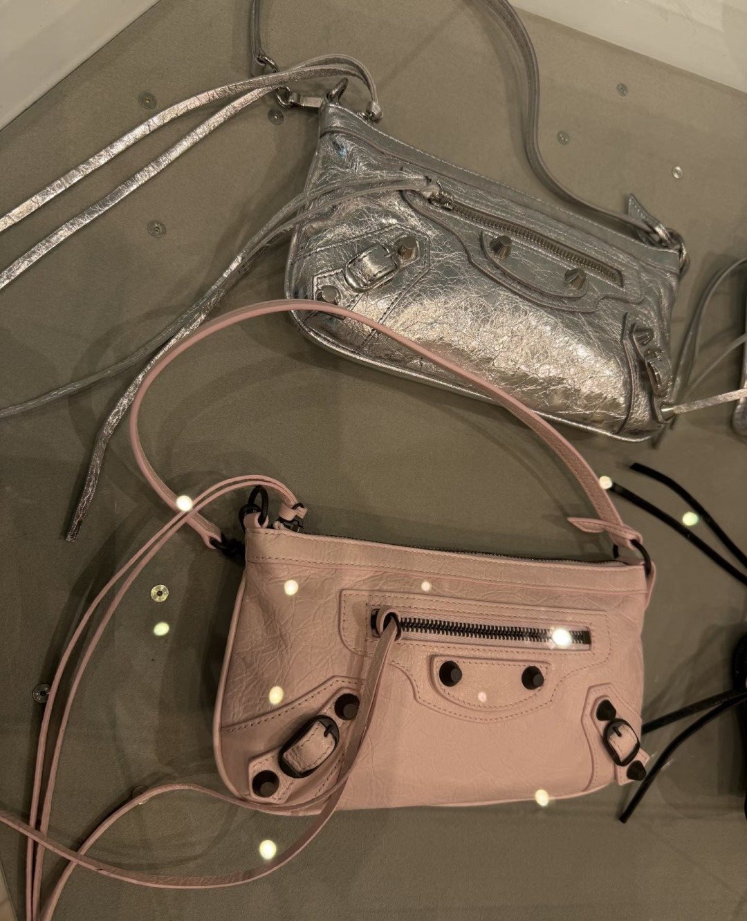 Balenciaga Studded Shoulder Bag with Long Zipper Ties — comparison
